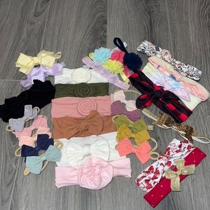 Lot of 31 baby girl head bands.